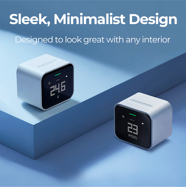 QP Lite Air Quality Monitor showing OLED display with real-time PM2.5, CO₂, temperature, and humidity readings.