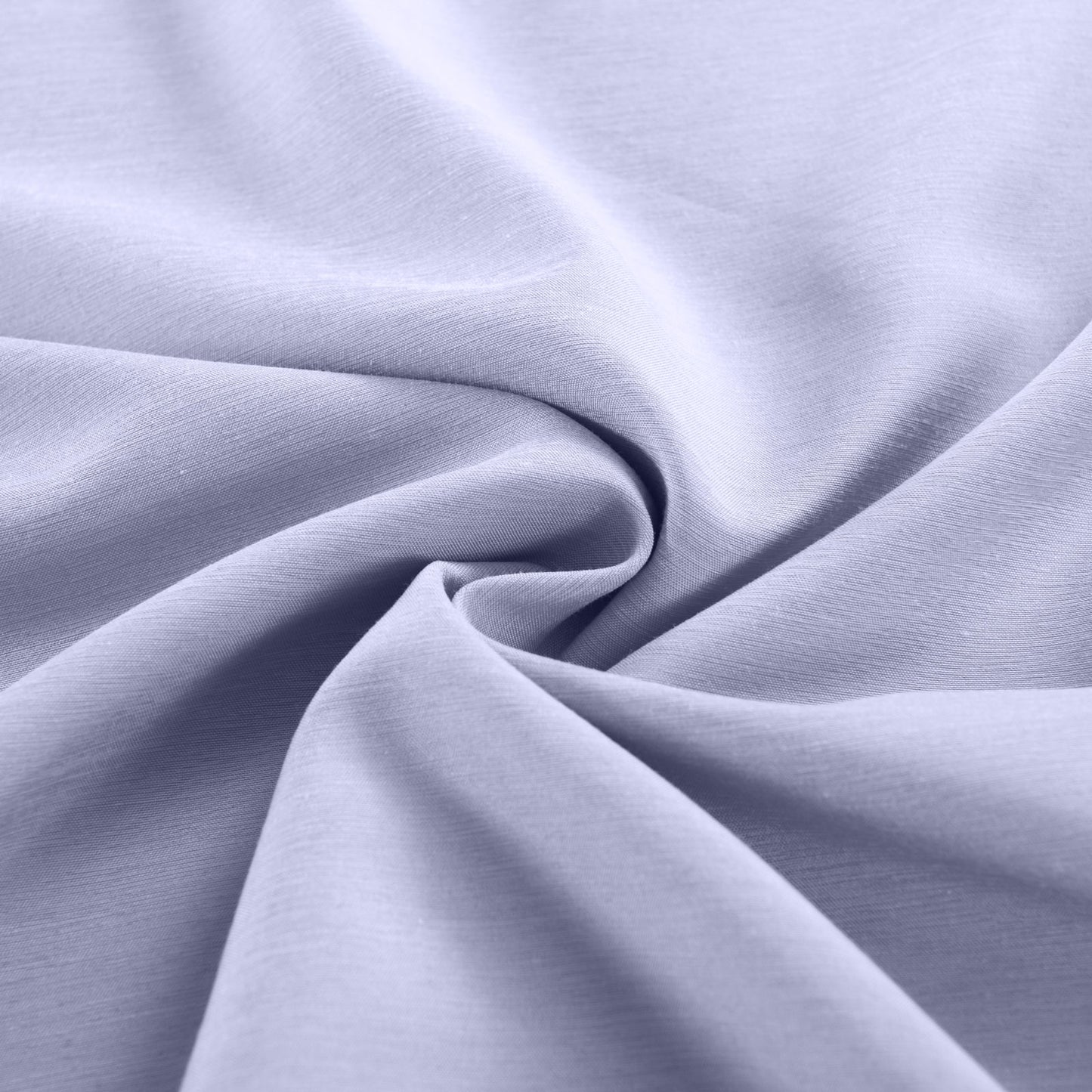Close-up of light purple fabric with folds
