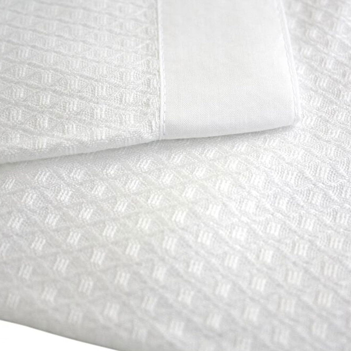 Bamboo waffle cot blanket draped showing softness | Dust Mite Allergy Solutions Australia