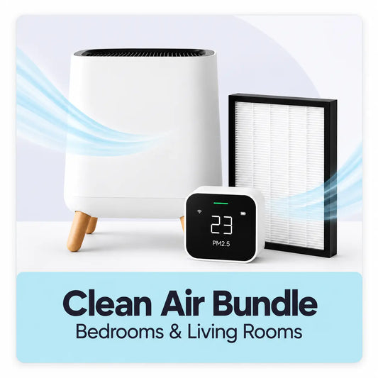 Clean Air Bundle for allergy and dust mite sensitive households featuring a white Smart Air Sqair air purifier with wooden legs, a black-framed replacement filter, and a small digital Quingping PM2.5 monitor, shown against a light background with blue airflow graphics and a text banner reading 'Clean Air Bundle Bedrooms & Living Rooms'.