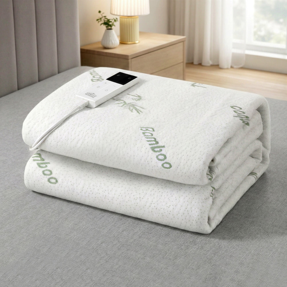 Electric blanket with controller on a bed in a bedroom setting. bamboo electric blanket fitted heated underlay single bed Dust Mite Allergy Solutions Australia