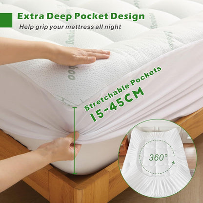 Mattress protector with stretchable pockets and hand demonstrating fit on mattress