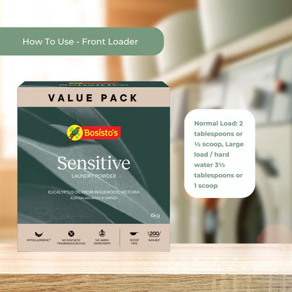 Bosisto's Sensitive laundry powder value pack on a wooden surface with a blurred background