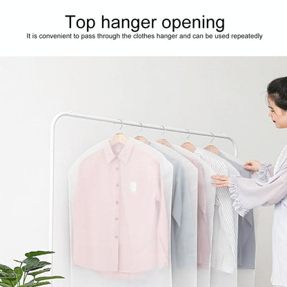 Person using a garment cover on a hanger with text about top hanger opening