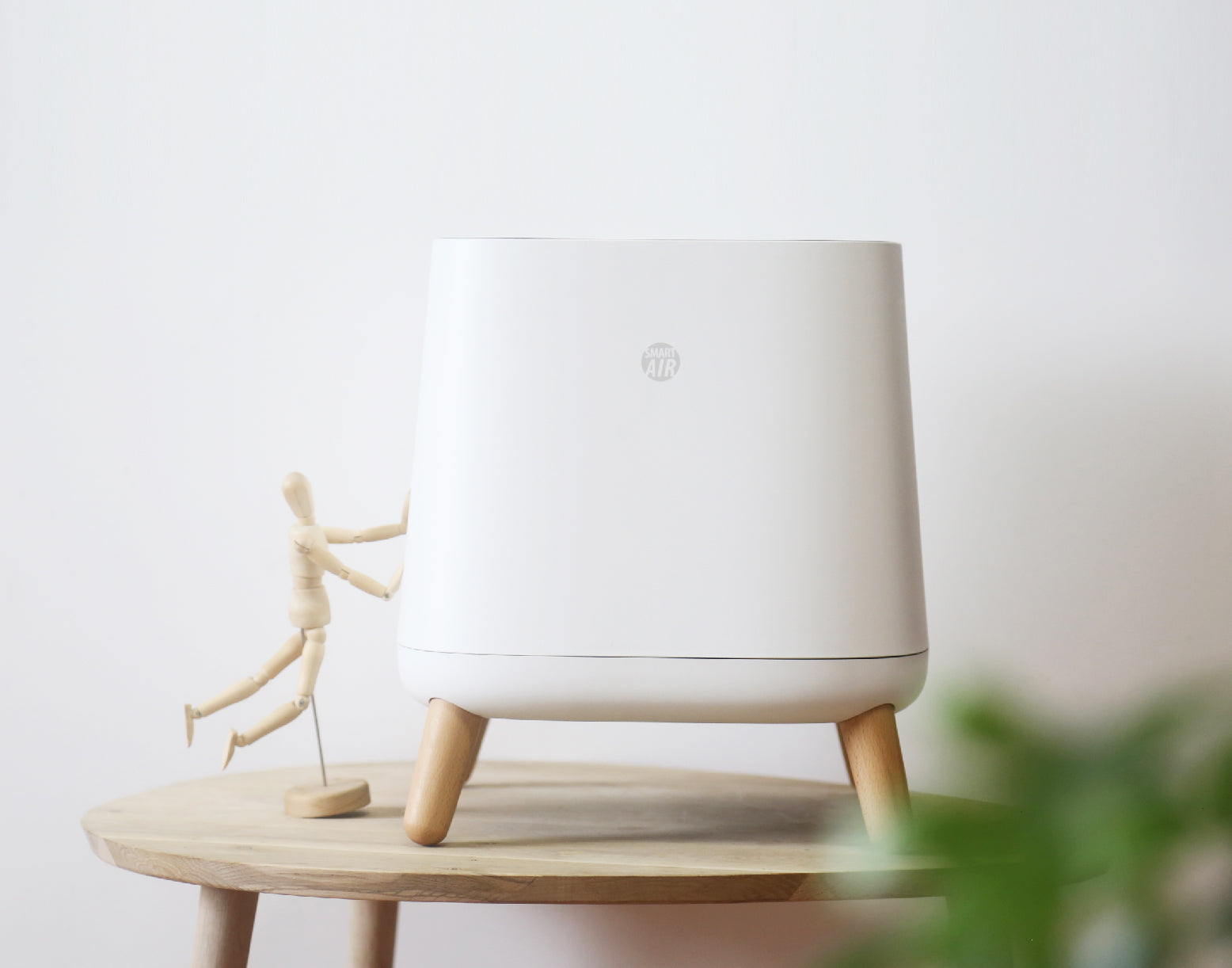SmartAir Sqair air purifier in use on bedroom floor — overnight allergen filtration for dust mite allergy households