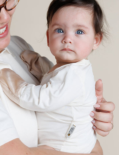 Organic bamboo baby bodysuit with fold-back mulberry silk mittens