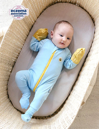 Blue organic bamboo baby onesie, breathable and eczema-friendly, by Honey & Stitch